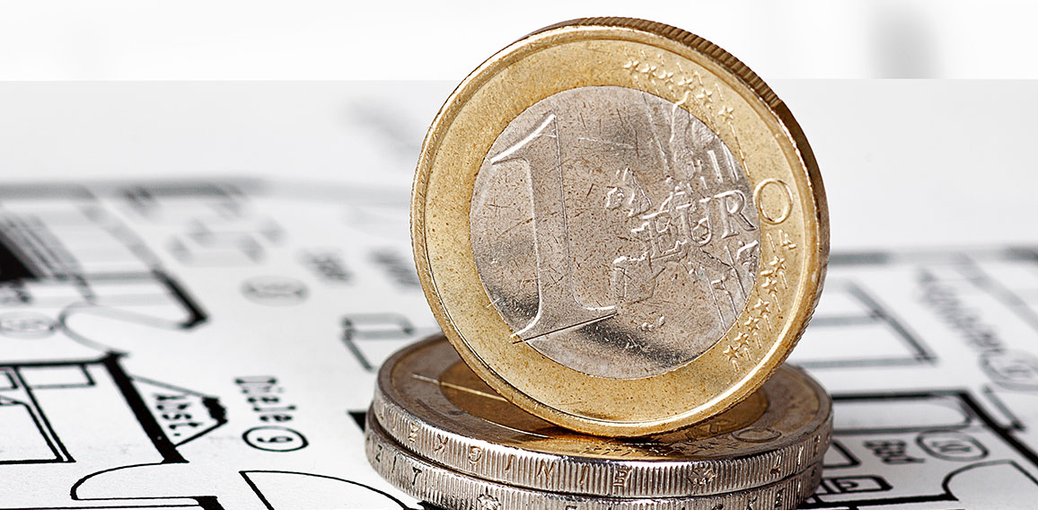 EURO coins with construction plan