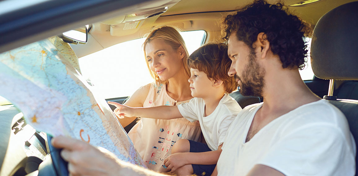 The family travels in the car in the summer