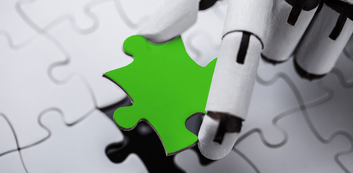 Robot Holding Green Jigsaw Puzzle