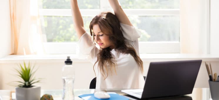 Businesswoman Stretching Her Arms