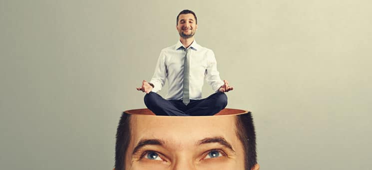 man looking up at calm yoga man