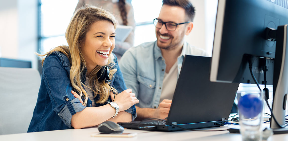 Group of business people and software developers working as a te