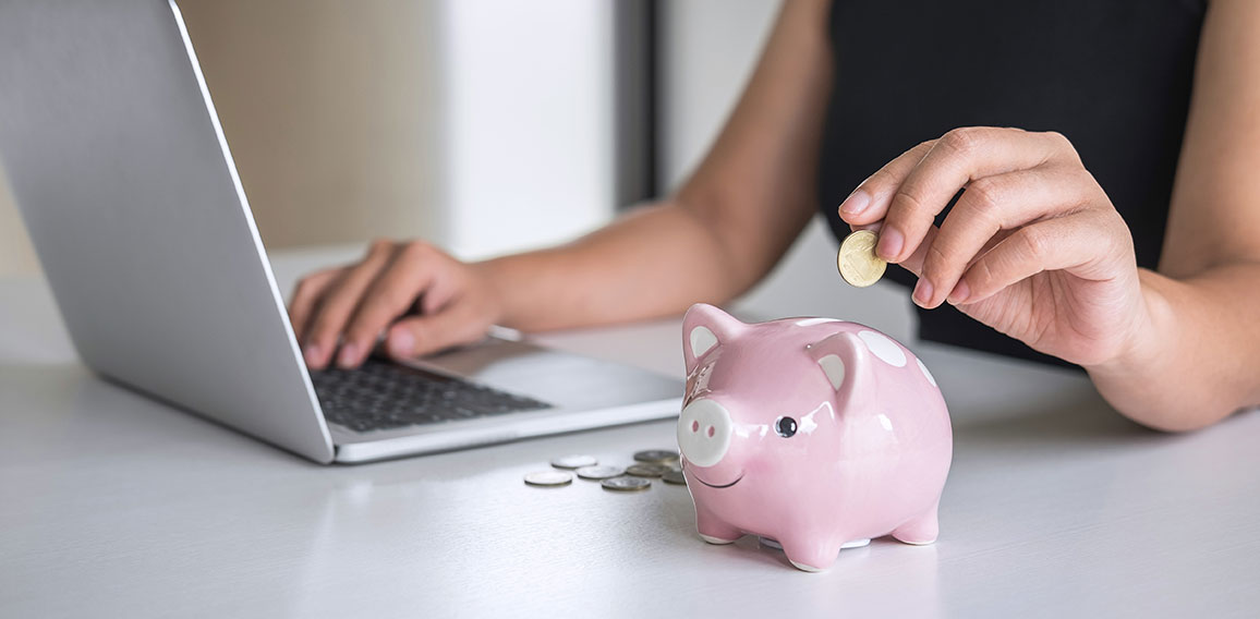 Woman putting golden coin in pink piggy bank for step up growing