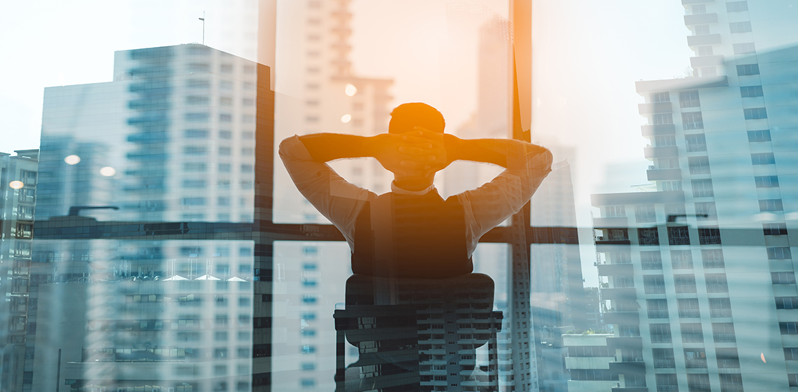 Portrait of relaxed businessman in modern office.Business young