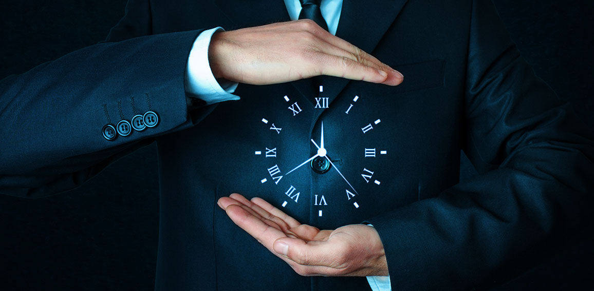 Businessman holding clock. Business time management .