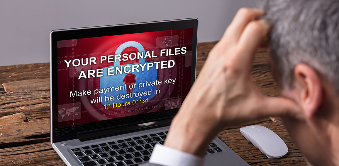 Looking At Laptop Screen Showing Personal Files Encrypted Text