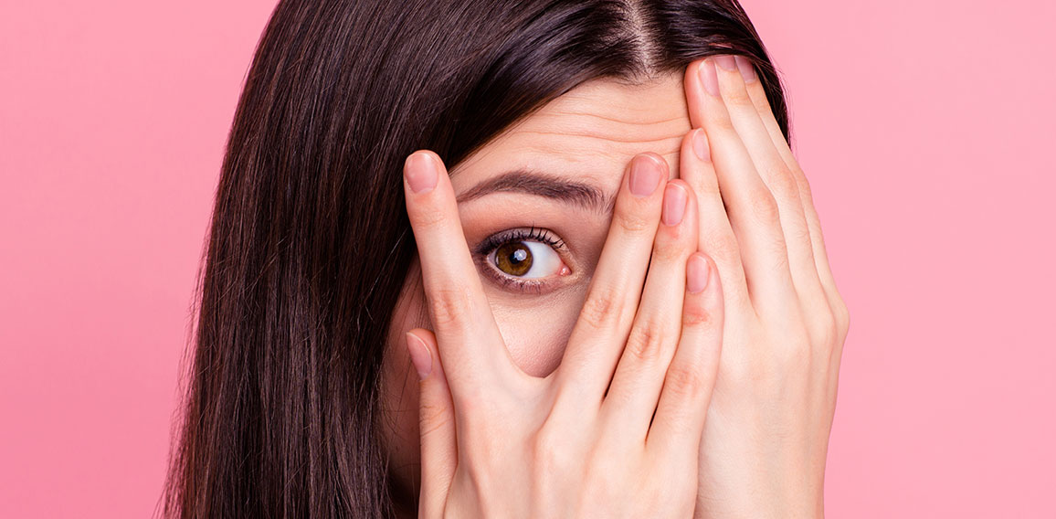 Close-up portrait of her she nice-looking attractive charming lovely confused worried puzzled straight-haired lady closing face palms isolated over pink pastel background