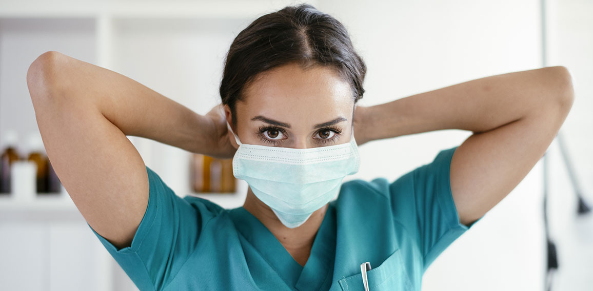 Young female doctor in medical office. Beautiful female doctor p