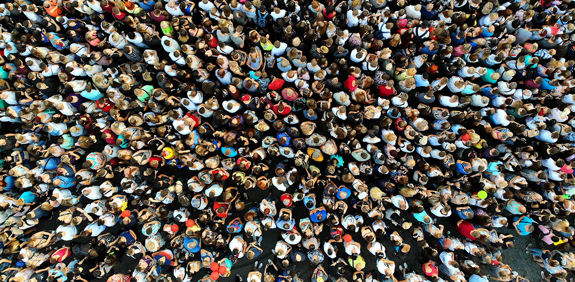 People crowd texture background. Top view from drone.