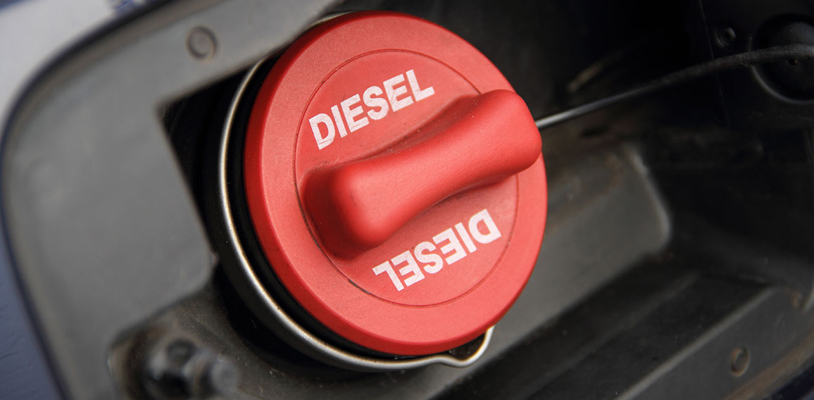 a red fuel cap with the inscription "Diesel"