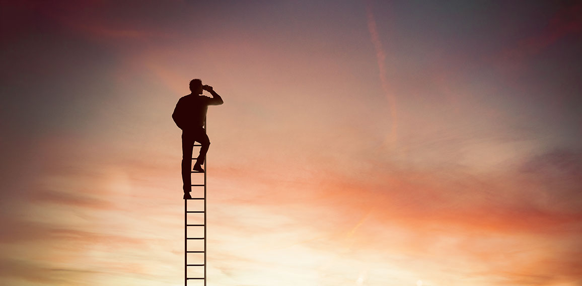 Businessman looks far for new business with binocular