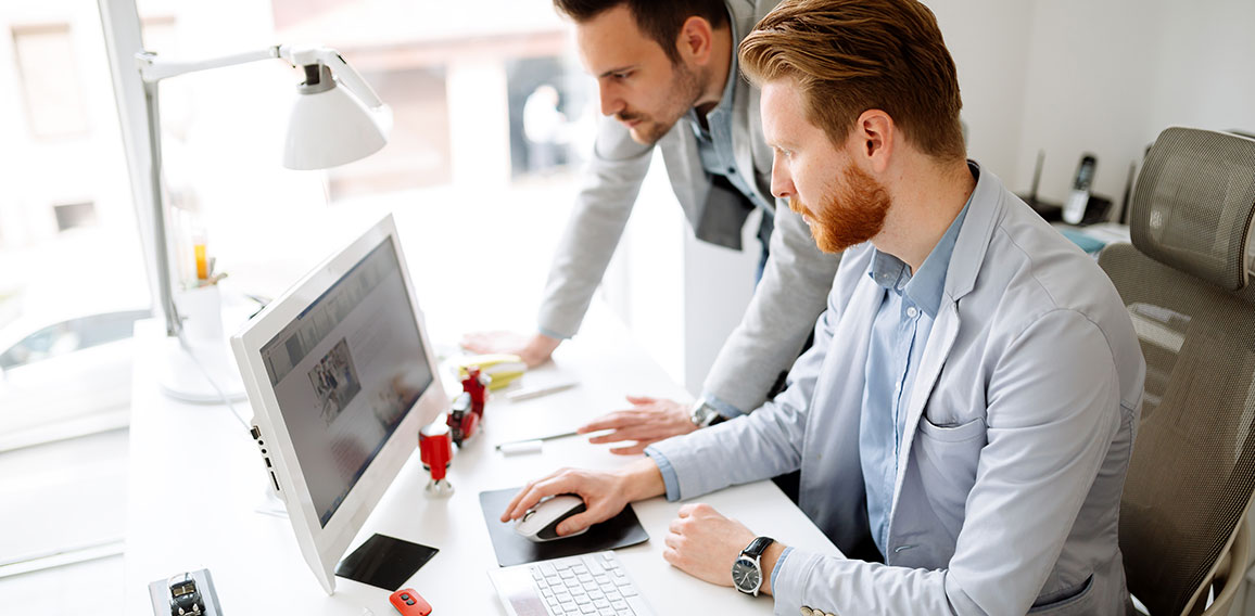 Coworkers planning startup goals