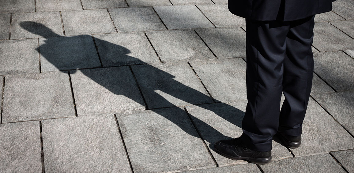 Shadow of a businessman standing