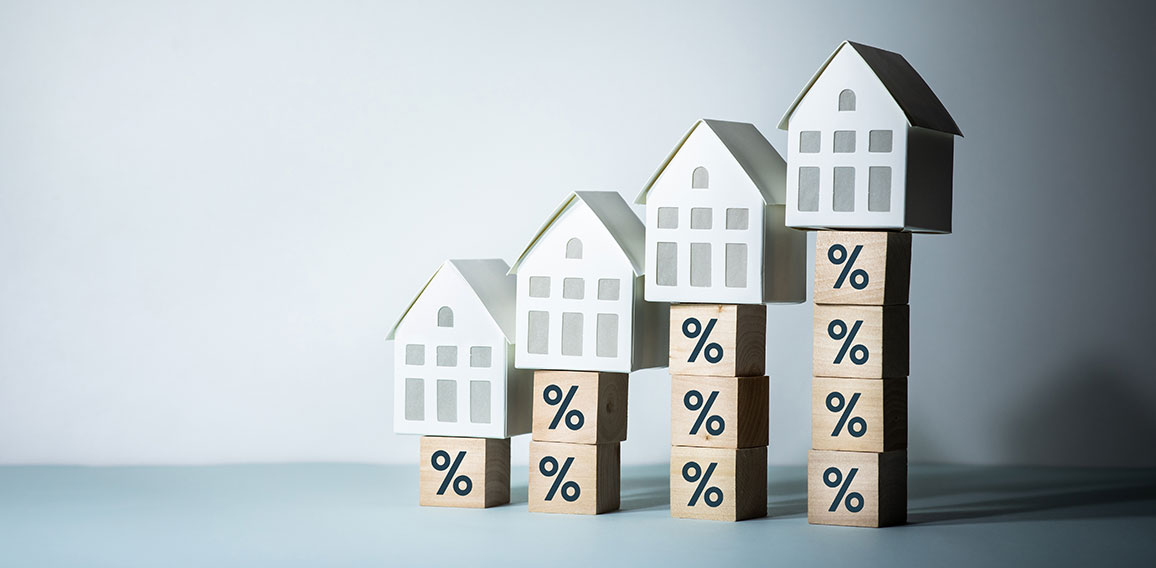 Real estate or property risk concepts with percentage sign and h