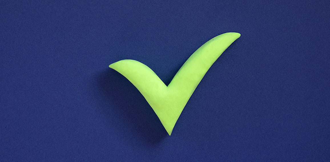 Checkmark sign on blue background. Concept of well done, confirm