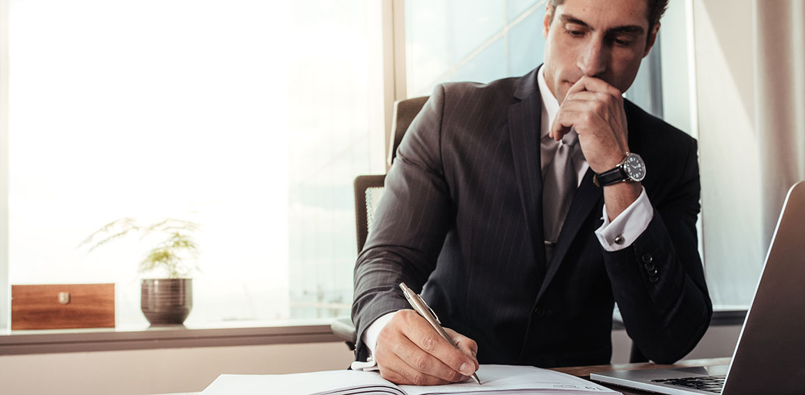 Male entrepreneur working at his desk