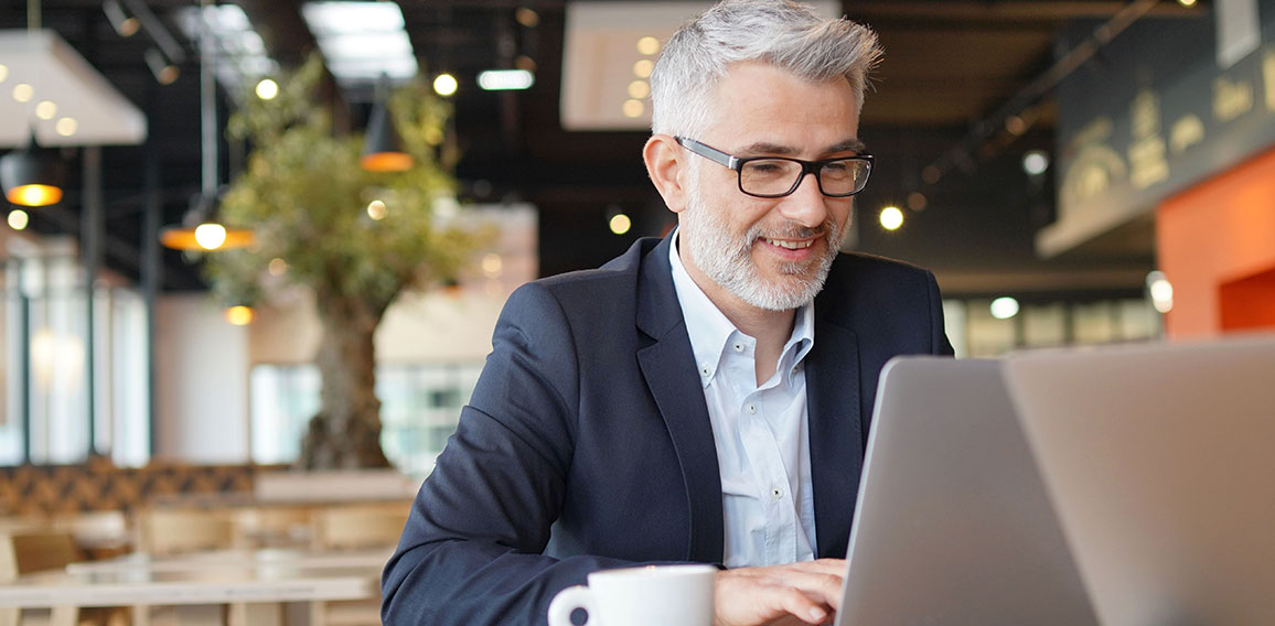 Smiling businessman in informal meeting