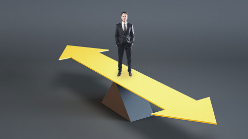 Young businessman standing on abstract balancing different direction arrow on gray background with mock up place. Choice, solution and mock up concept.