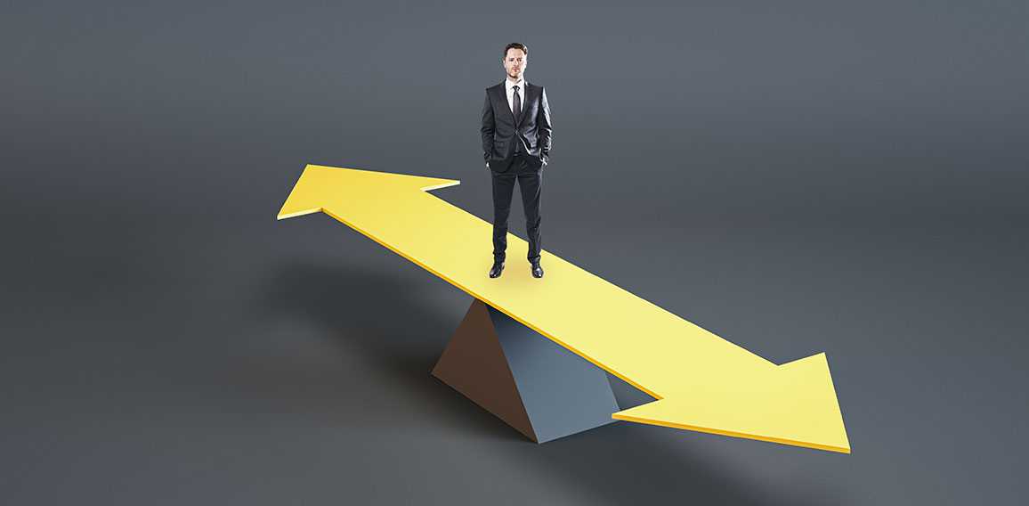 Young businessman standing on abstract balancing different direction arrow on gray background with mock up place. Choice, solution and mock up concept.