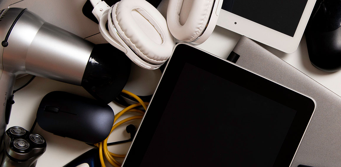 Old computers, digital tablets, mobile phones, many used electronic gadgets devices, broken household and appliances on white background. Planned obsolescence, electronic waste for recycling concept