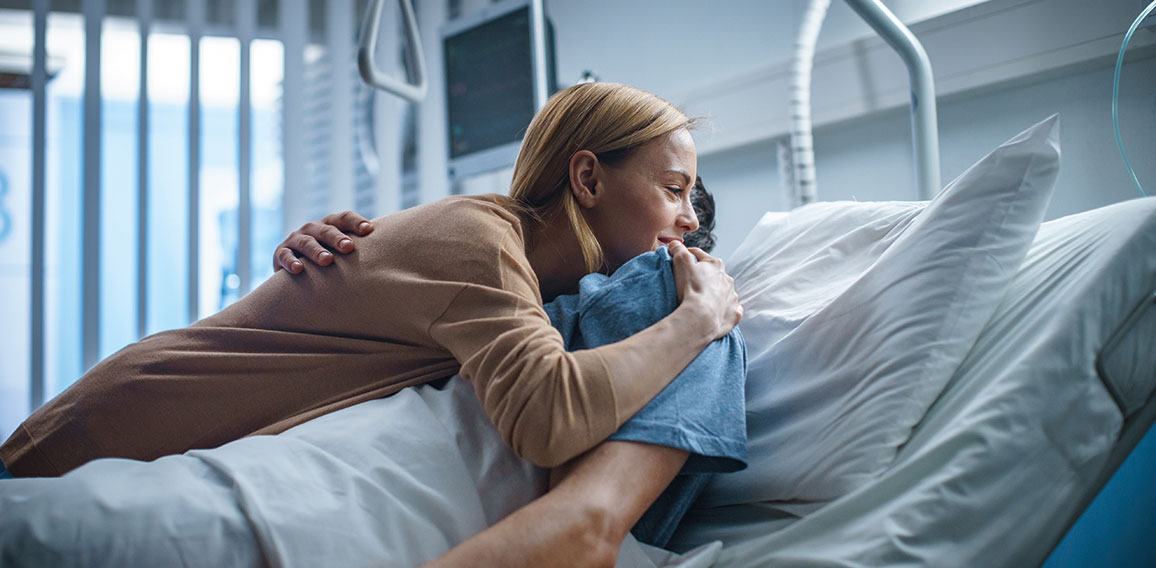 In the Hospital, Happy Wife Visits Her Recovering Husband who is