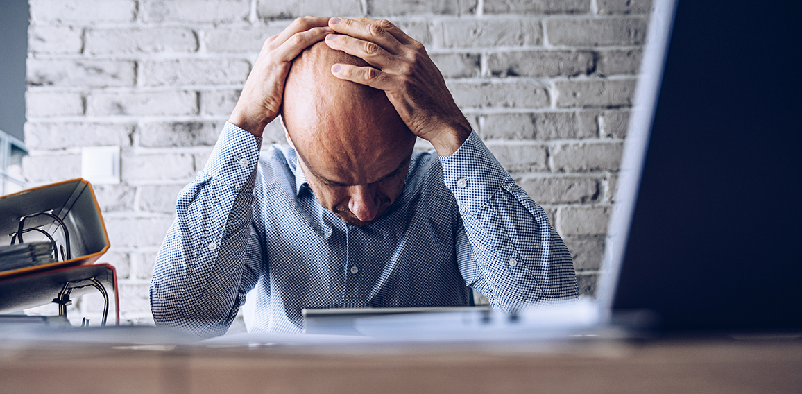 Nervous upset man with financial problems. Depressed man and financial crisis.