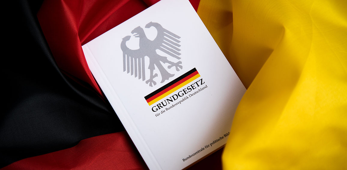 The book of German constitution basic law on flag of federal republic of Germany