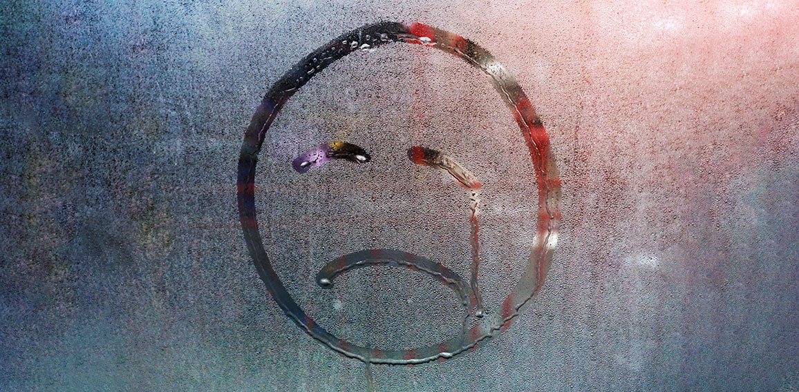 Sad smiley of raindrops