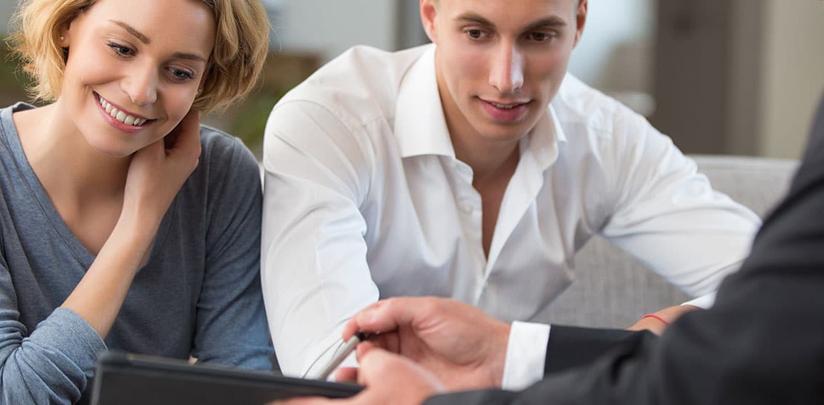 couple meeting financial adviser for investment