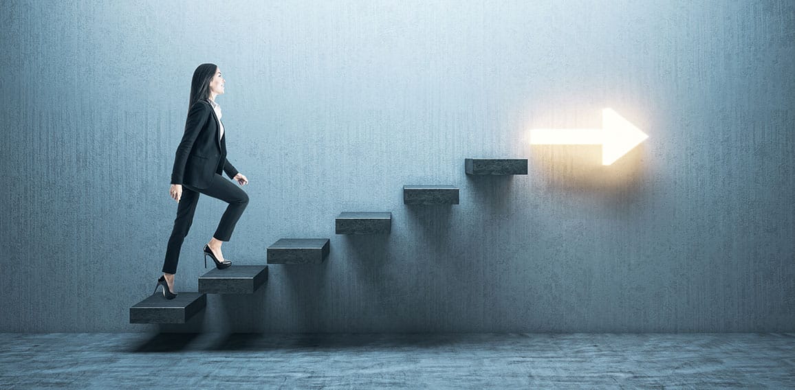 Young businesswoman moving up on stairs with arrow