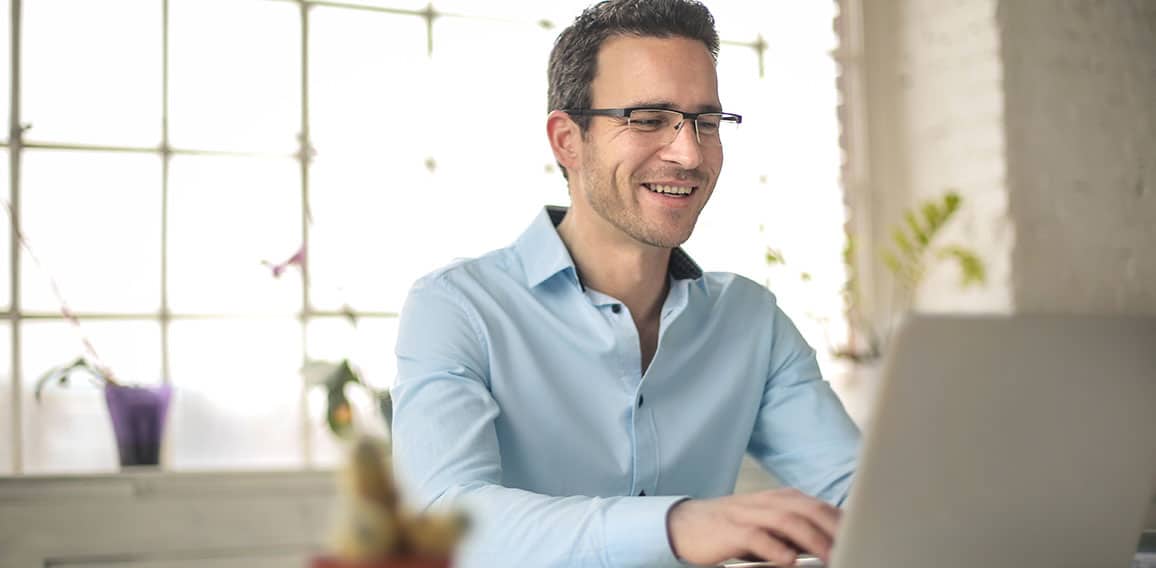 Successful businessman working with his laptop