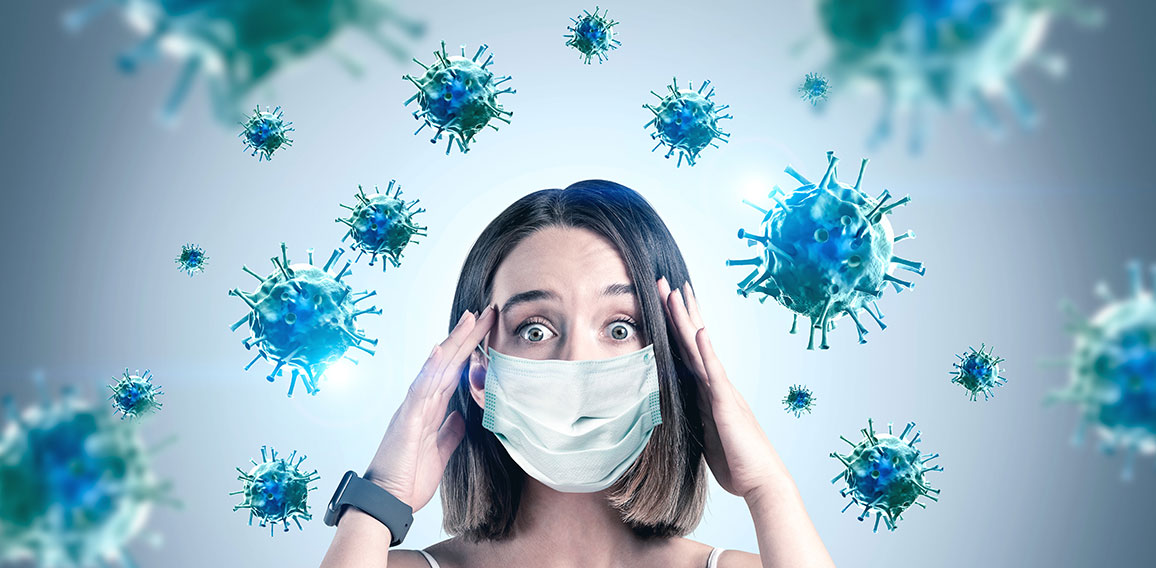 Scared young woman in mask, coronavirus panic