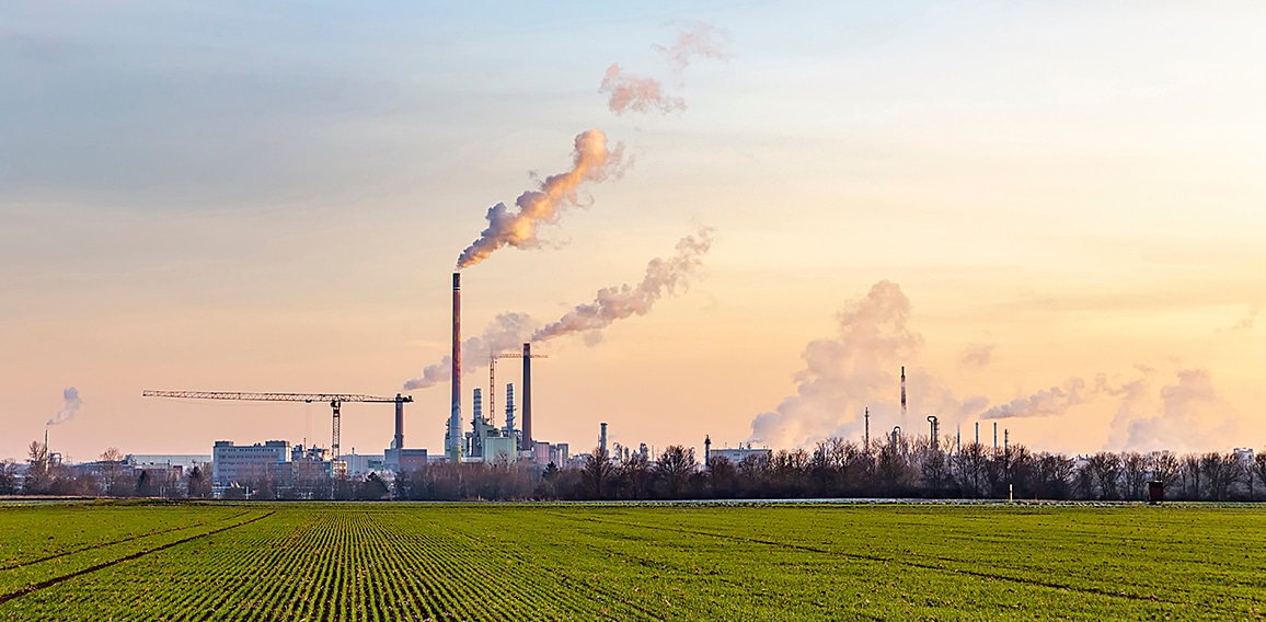 industry complex in Frankfurt in late evening with  fields and s