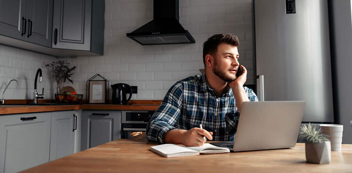 Young male freelancer works from home