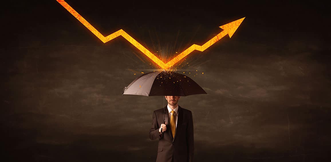 Businessman standing with umbrella keeping orange arrow