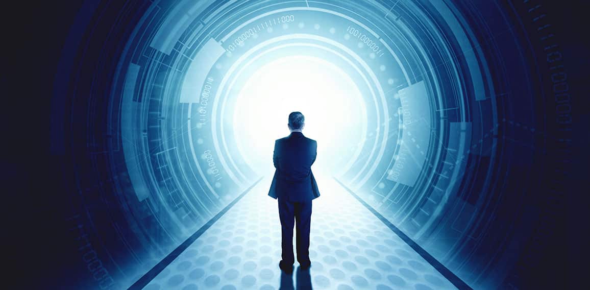 Rear view of businessman standing in front of a futuristic tunne