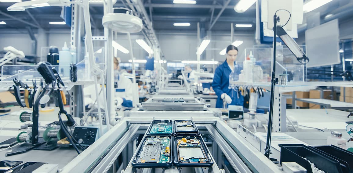 Shot of an Electronics Factory Workers Assembling Circuit Boards