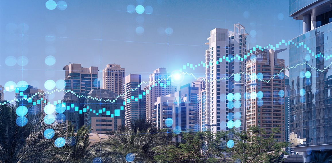 Panoramic view of steel and glass skyscrapers of Dubai Marina. Modern cityscape of the capital of the UAE. Financial services hub. FOREX graph and chart concept. Double exposure.