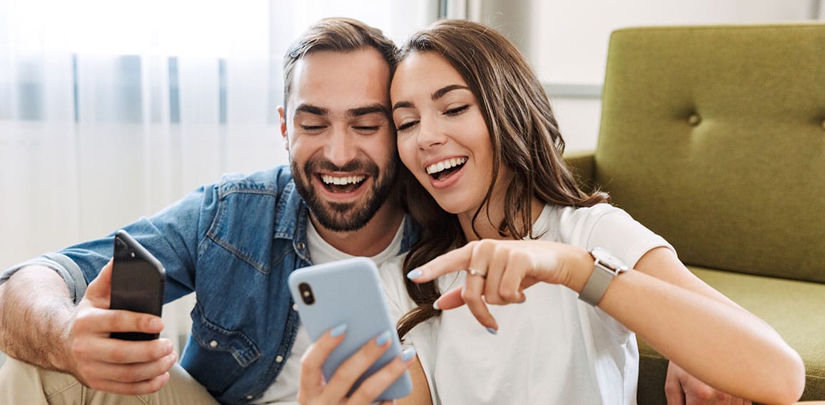 Beautiful young couple in love at home