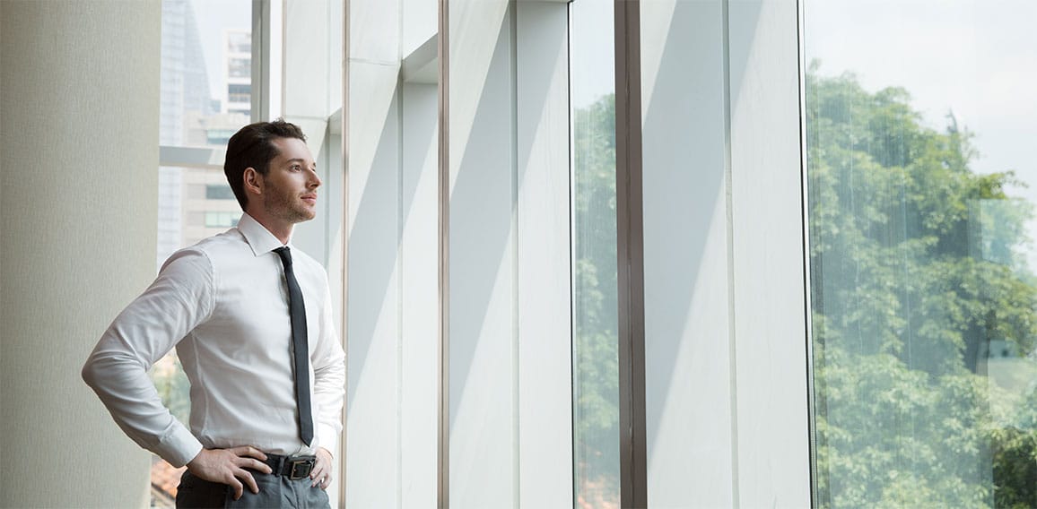 Portrait of Businessman at Window 4