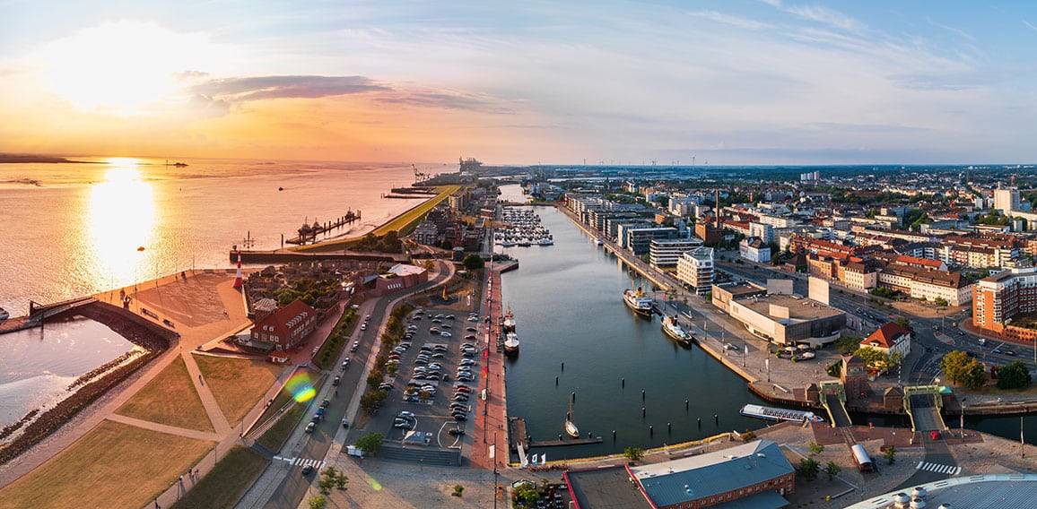 Sunset in Bremerhaven with houses and ships