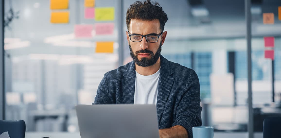 Modern Office: Portrait of Young Stylish Businessman Wearing Gla