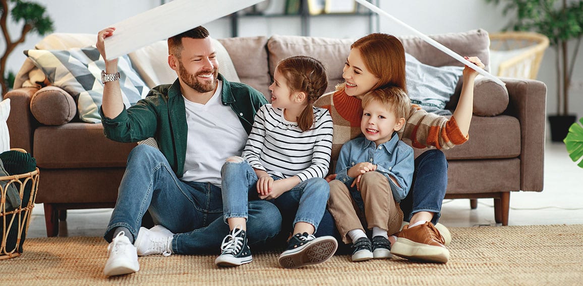 concept housing a young family. mother father and children in  new home