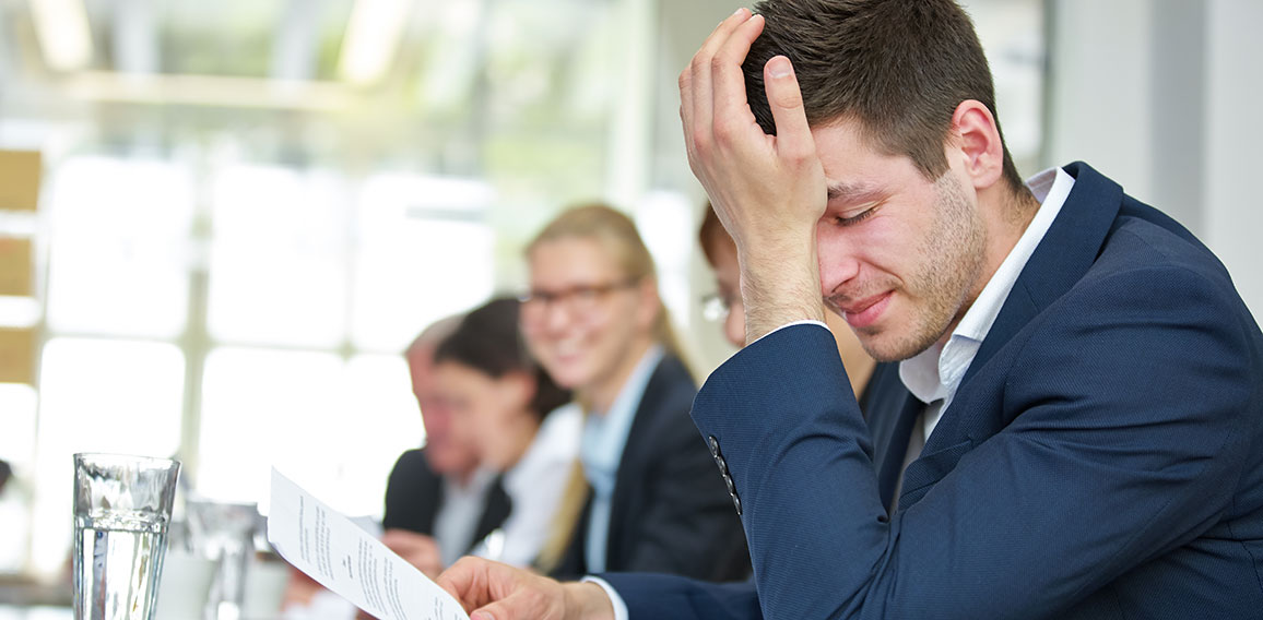 Geschäftsmann mit Burnout in Business Meeting