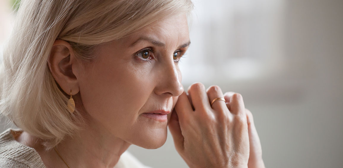 Thoughtful serious anxious mature senior woman feeling worried a