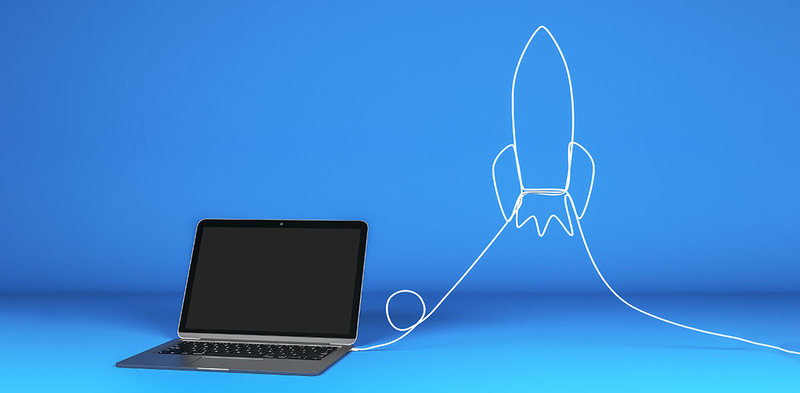 Blank laptop with rocket