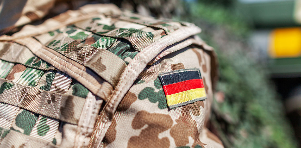 german flag on a german soldier desert uniform