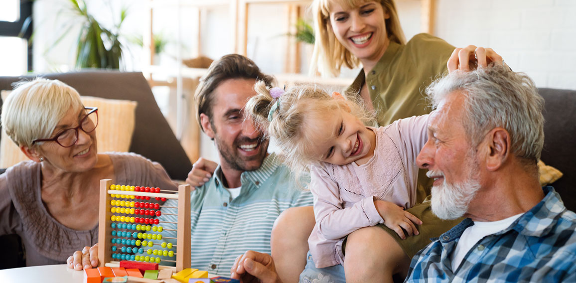 Cheerful multi-generation family having fun while spending time together at home.