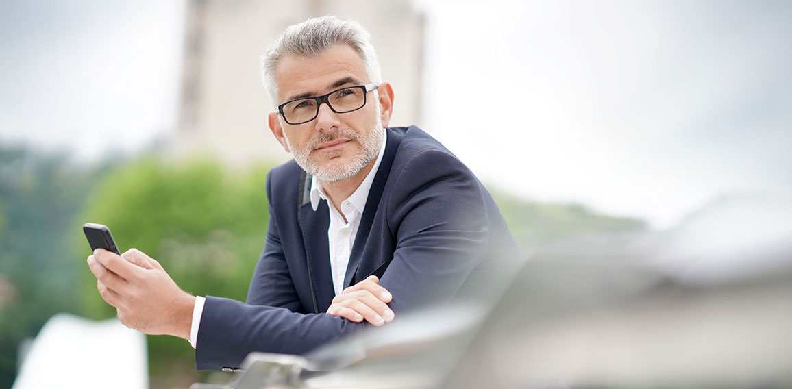 Businessman in town waiting for meeting