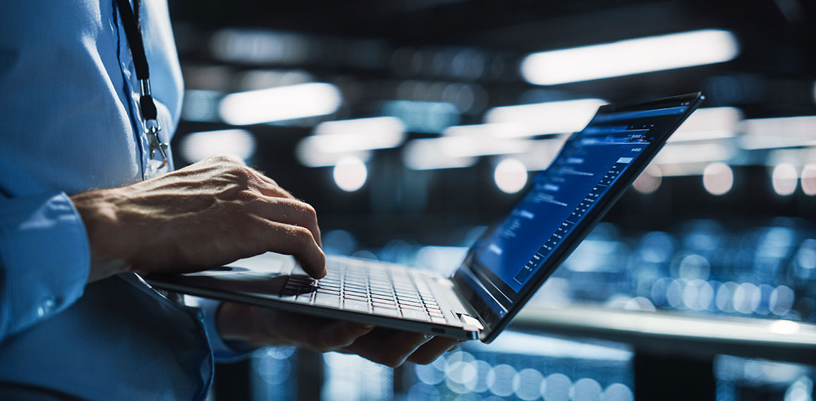 Data Center Programmer Using Digital Laptop Computer, Maintenanc